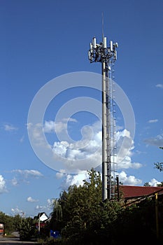 Cellular antenna with a ladder to climb on it.