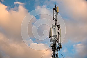 Cellular antenna. Mobile phone communication tower with blue sky