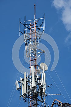Cellular antenna steel towers in blue sky