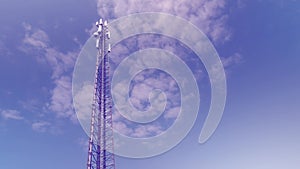 Cellular antenna tower and electronic radio transceiver equipment part of a cellular network under the blue sky. Radio transceiver