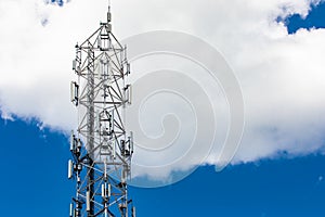 Cellular base station against blue sky.