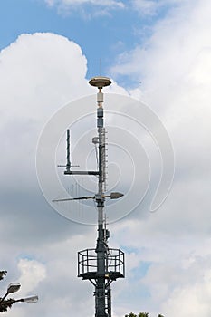 Cellular, mobile phone transmitter tower and weather station