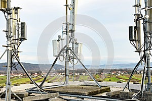 Cellular radio telecommunication network antenna mounted on a metal pole providing strong signal waves