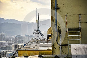 Cellular radio telecommunication network antenna mounted on a metal pole providing strong signal waves