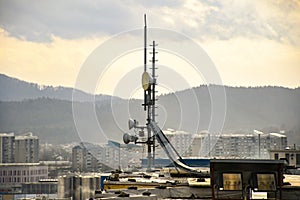 Cellular radio telecommunication network antenna mounted on a metal pole providing strong signal waves