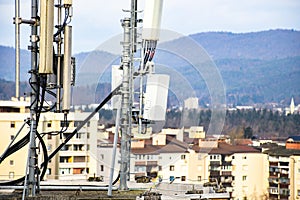 Cellular radio telecommunication network antenna mounted on a metal pole providing strong signal waves