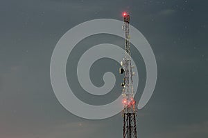 Cellular signal transmitter tower at night