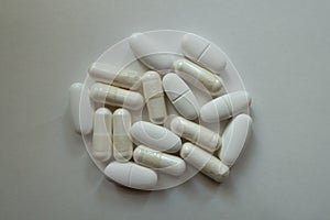 Cellulose white capsules of magnesium citrate and caplets of calcium citrate