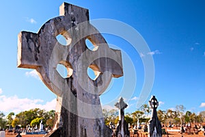 Celtic cross blue sky graveyard