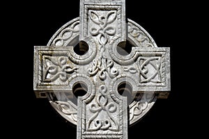 Celtic cross cemetery on black