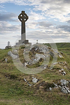 Celtic cross concept landscape in Ynys Llanddwyn Island in Angle photo