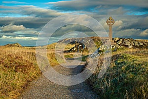 Celtic cross on Llanddwyn Island, a peninsula on Anglesey. Newborough, Anglesey,