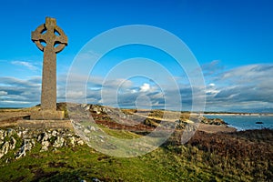 Celtic cross on Llanddwyn Island, a peninsula on Anglesey. Newborough, Anglesey,