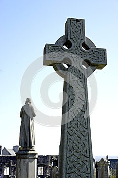 Celtic cross and patron saint photo