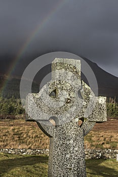 Celtic Cross and Rainbow on the Isle of Skye in Scotland.