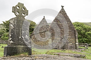 Celtic cross and ruin of church, Kilmalkedar Church and graveyard Ireland