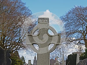 Celtic cross sculpture found on an old historical grave tomb in Glasnevin cemetery, Dublin photo