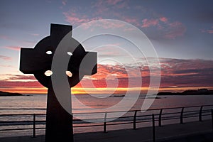Celtic cross at sunset