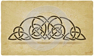 Celtic interlacing decorative knot on vintage background photo