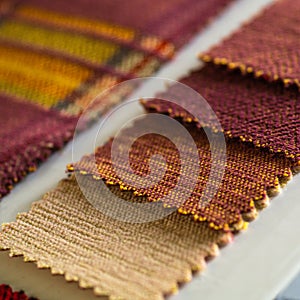 Celtic plaid background. Catalog of multicolored cloth from matting fabric texture background