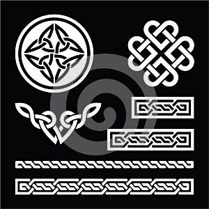 Celtic white knots, braids and patterns on black background