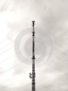 Celular antenna with cloudy background photo