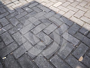 Cement bricks that are made into the parking area floor