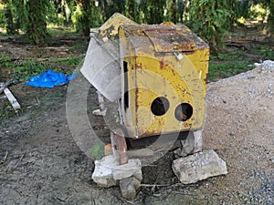 Cement or concrete mixer machine located on the construction farm