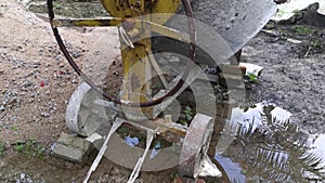 Cement or concrete mixer machine located on the construction farm