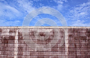 Cement concrete wall and blue sky white clouds