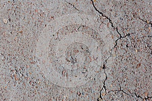 Cement with cracks and inclusions of stones