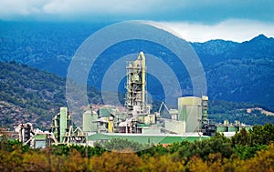 Cement factory in mountains.