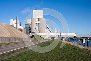 Cement factory near a canal in the Netherlands