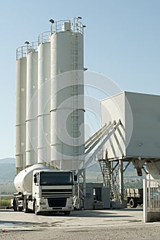 Cement factory and a truck loading cement