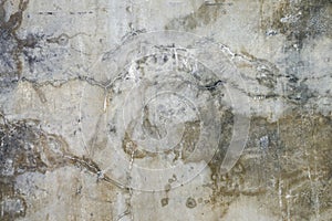 The cement flap surface has scratches, black and white stains, traces caused by plastering to create an artistic pattern
