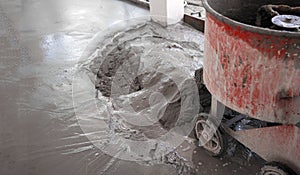 Cement flooring process with spinning matchine photo