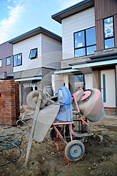 Cement mixer and wheel barrow