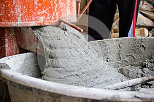 Cement or mortar is inside cement mixer. Cement or mortar is mix
