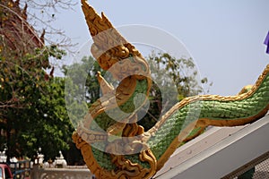 A cement pillar depicting a serpent, a literary animal housed in a Thai temple, is beautiful, Thai culture.