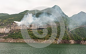 Cement plant and bridge in Xiling Region on Yangtze River, China