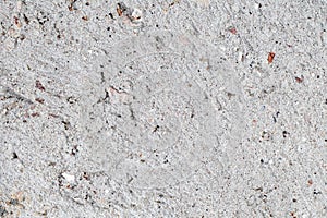 Cement plaster rough with streaks and inclusions close-up background