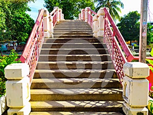 Cement stairs bridge across a canel