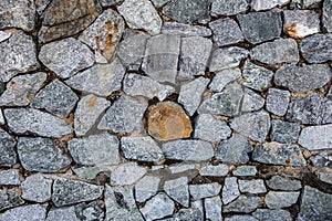 Cement and stone walls on the beach.