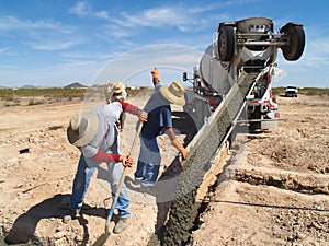 Cement Truck Pouring Cement into Hole - Horizontal