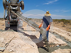 Cement Truck Pouring Cement into Hole - Horizontal