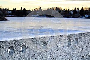 Cement wall at Beaumaris Lake Edmonton during winter