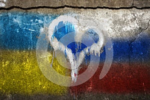 Cement wall with graphite of the Ukraine and Russian flag. Heart in the middle.
