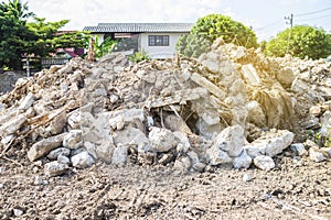 Cement waste mountain at the construction site, space clearing to build the hous