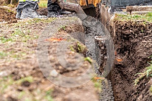 cementing the foundation in the ground when building a house