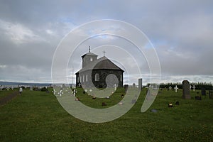 Cemetery with Church in Iceland photo